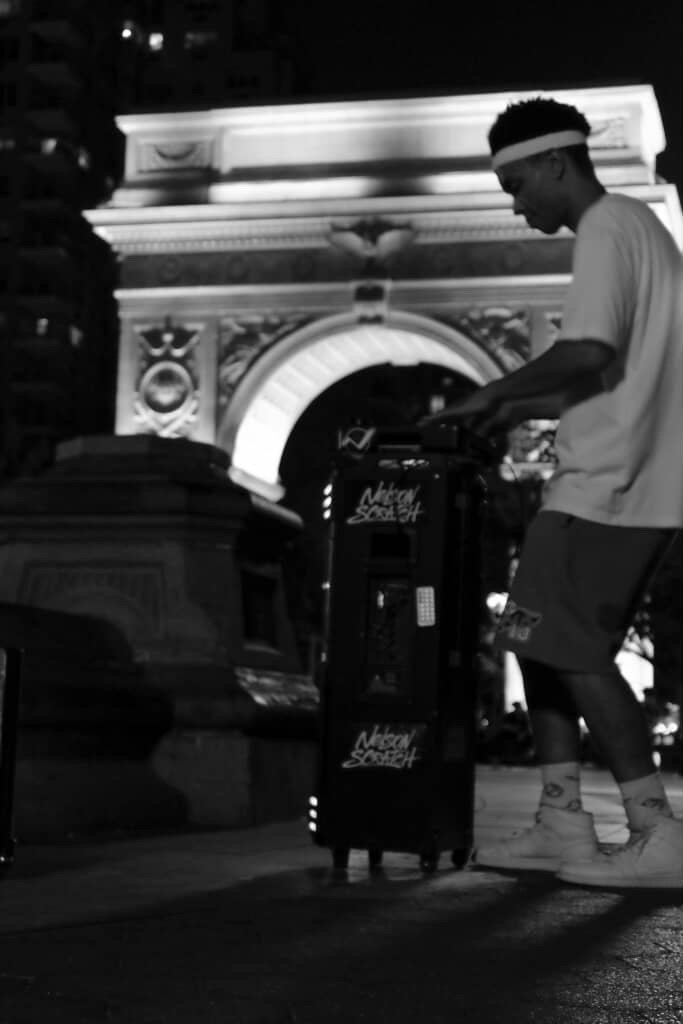 Nelson Scratch from Hug Bookings in Washington Square Park with his Streetbeats set up scratching on beats