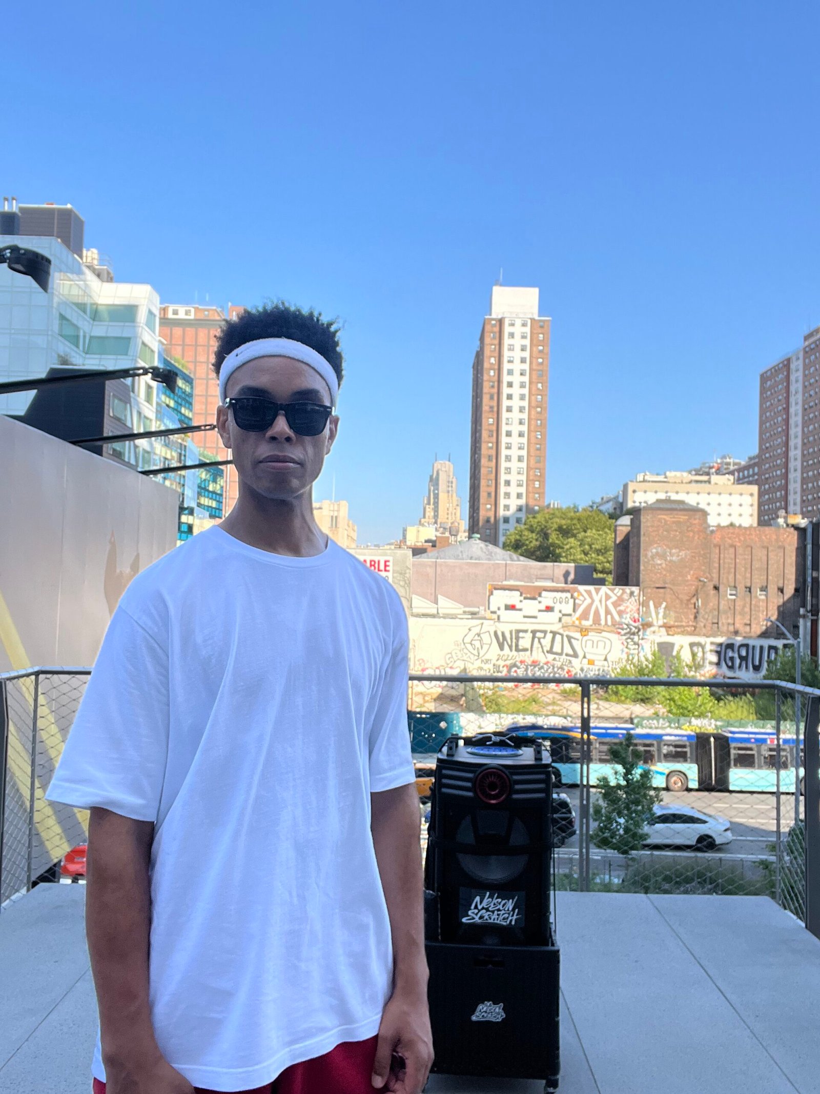 DJ Nelson Scratch from Hug Bookings at The High Line in Manhattan standing next his Streetbeats set up